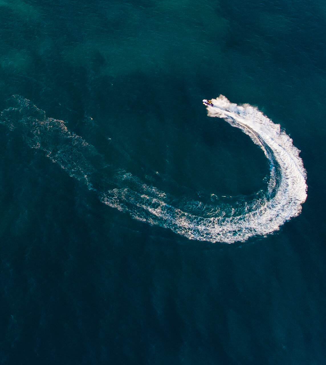 Jet Ski Turning on Blue Water